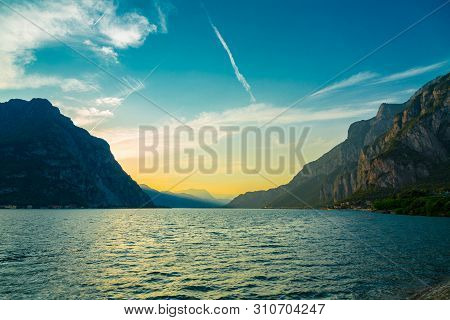 Idyllic Sunset Over Lake Como And Monutains Taken From Lecco City, Lombardy, Italy
