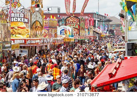 Calgary, Canada - July 9, 2019: A Crowd Filled The Street On Olympic Way Se At The Annual Calgary St