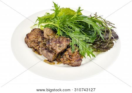 Slices Of Fried Liver, Green Leaves Of Salads