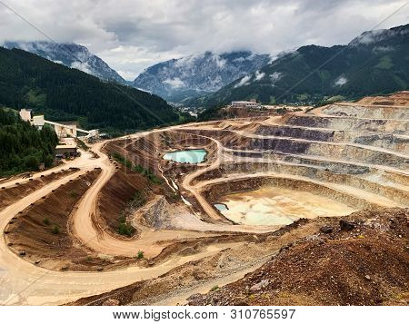 Open Cast Mining Erzberg, Austria, Landscape Of Winding Roads For Mining