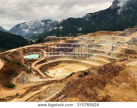 Open Cast Mining Erzberg, Austria, Landscape Of Winding Roads For Mining