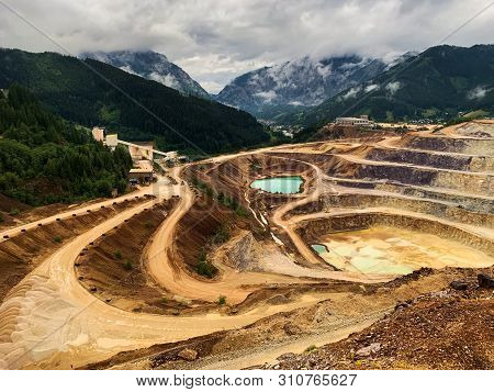Open Cast Mining Erzberg, Austria, Landscape Of Winding Roads For Mining