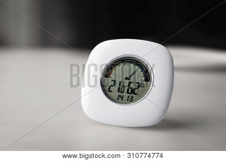 Close View Of Electronic Thermometer Hygrometer On A Blurry Background