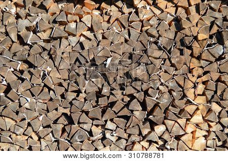 Big Wood Stack Of Wood. Woodpile. Firewood. Background. Close-up