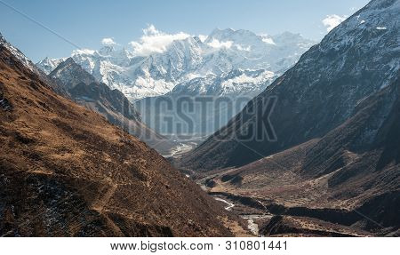 View Of Snow Covered Range Of Mount Manaslu And Valley On The Way To Pass 8 156 Meters With Clouds I