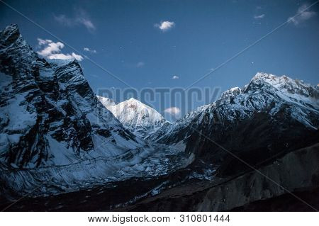 View Of Snow Covered Peak Of Mount Manaslu During Sunrise (8 156 Meters) With Clouds In Himalayas, S