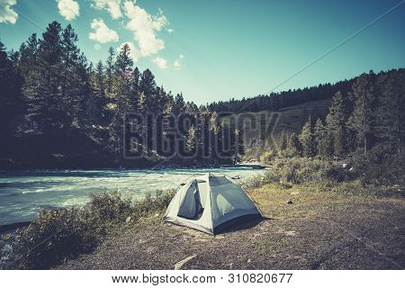 Camping Tent In The Nature. Mountains And Lake.
