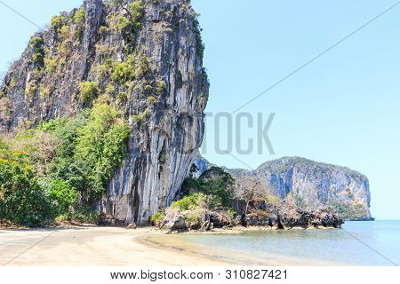 Rajamangala Beach With Limestone Cliffs In The Background,trang Province, Thailand