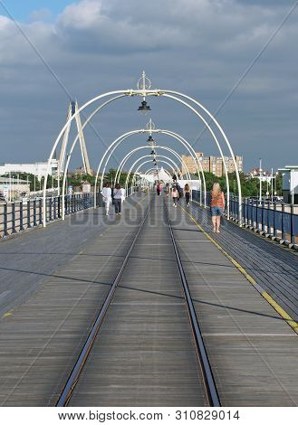 Southport, Merseyside, United Kingdom - 28 July 2019: The Historic Pier In Southport Merseyside With