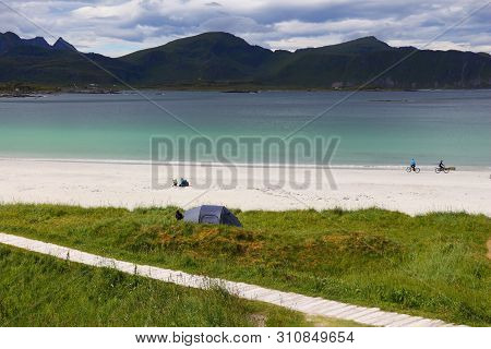 Norway Beach - Arctic Norway Landscape With Dramatic Clouds. Lofoten Islands Ramberg Beach.
