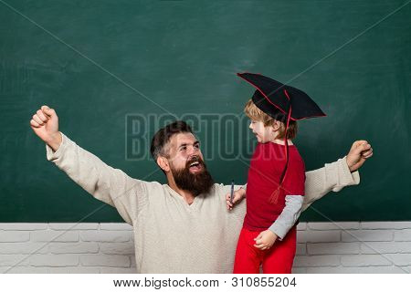 Being Joyful And Thrilled. Dad And Son Having Fun In Time And Its Effects. Happy Family. Father And 