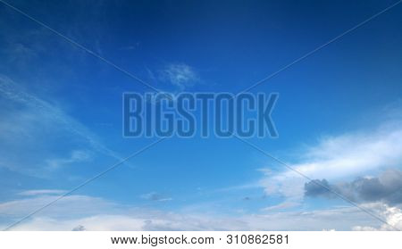 Summer Deep Blue Sky With Easy Light White Clouds