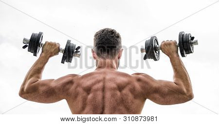 Fit Your Body And Lose Weight. Muscular Back Man Exercising In Morning With Barbell. Athletic Body. 