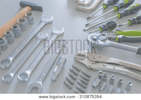 Beautifully Placed On Desk Hand Tools, Such As: Hammer, Screwdriver, Combination Wrenches, Hexagonal