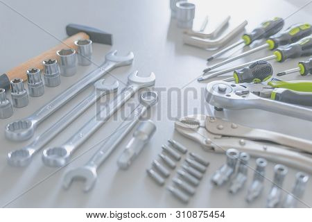 Beautifully Placed On Desk Hand Tools, Such As: Hammer, Screwdriver, Combination Wrenches, Hexagonal