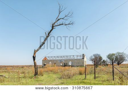 A Landscape, With A Ruin And A Dead Tree, Next To Road R38 Between Standerton And Bethal, In The Mpu