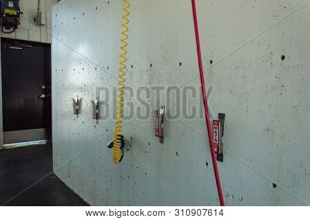 Inside A Car Wash Bay Looking Towards The Mat Cleaning Area