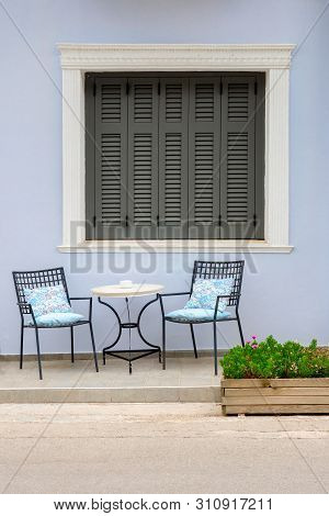 Cafe Exterior Background. Table And Empty Chairs Outdoor Near The Building. Tourist Places. Tavern E