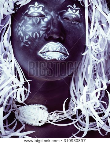 Creative Makeup Like Ethiopian Mask, White Pattern On Black Face Close Up, Halloween Horror