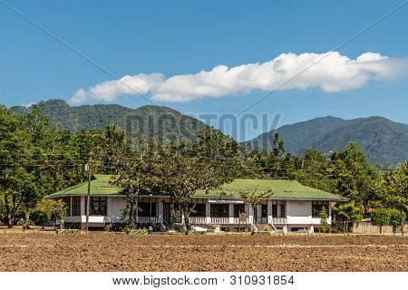 Puerto Princesa, Palawan, Philippines - March 3, 2019: Iwahig Penal Colony. White Central Office Bui
