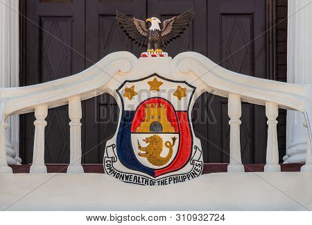 Puerto Princesa, Palawan, Philippines - March 3, 2019: Iwahig Penal Colony. Closeup Of Coat Of Arms 