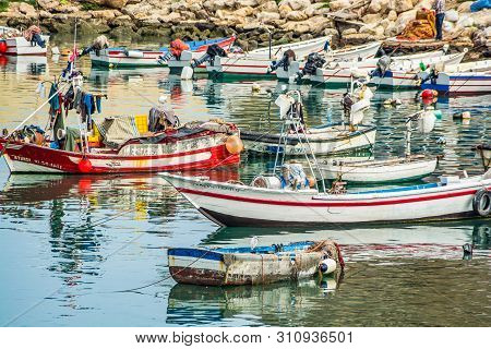El Jebha, Morocco - October 19, 2013. Marina With Colored Boats By Mediterranean Sea