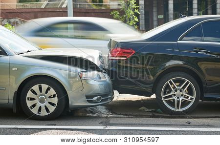 car crash accident on street. damaged automobiles