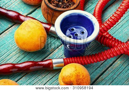 Smoking Arab Hookah With Apricots