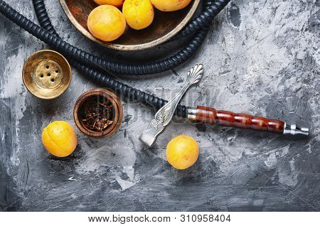 Smoking Arab Hookah With Apricots