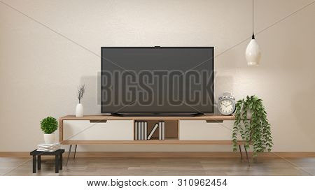 Tv On Cabinet In Zen Living Room With Lamp,table,cabinet And Plant .3D Rendering