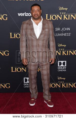LOS ANGELES - JUL 09:  Cedric Yarbrough arrives for Disney's 'The Lion King' World Premiere on July 09, 2019 in Hollywood, CA                