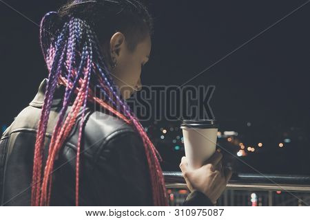 Portrait Of Beautiful Girl Drinking From A Paper Cup At Evening On The Street. Coffee To Go. Girl Wi