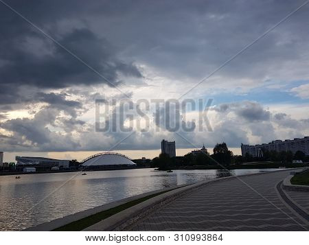 Minsk, Belarus Old Soviet Hotel Building In Central Part Minsk, Downtown Nemiga View With Water Refl