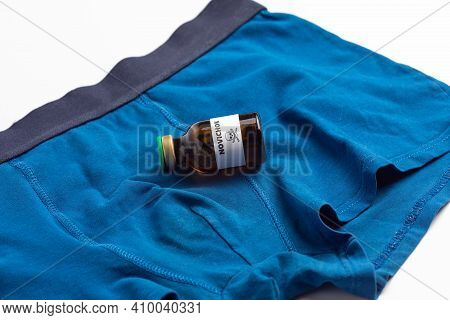 Vial With Poison Newbie On A White Background. Chemical Weapons Concept Newbie.