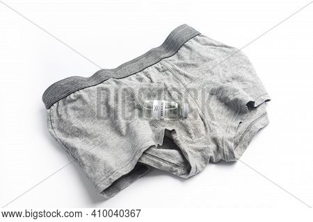 Poison Bottle Newbie On The Background Of Underwear. Chemical Weapons Concept New To Navalny
