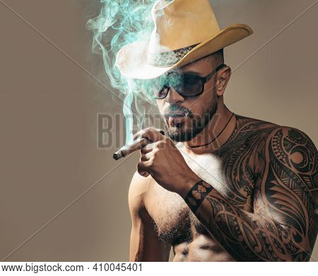 Man Smoke Cuban Cigar. Sexy Guy With Elite Cigars. Gangster Looks Like Mafiosi, Criminal Scene