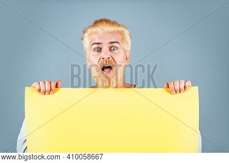 Business Man Showing Thumb Up Holds Sign Board. Colorful Studio Portrait On Isolated Background. Hap