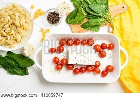Step-by-step Preparation And Ingredients For Oven-baked Feta Cheese With Tomatoes And Pasta, Pepper
