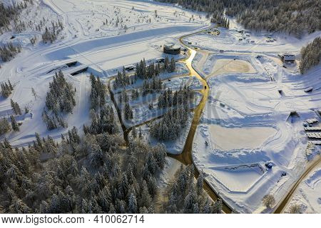 Aerial View Of Ski Jump In Planica, Slovenia At Ratece Near Kranjska Gora In Winter With Snow.
