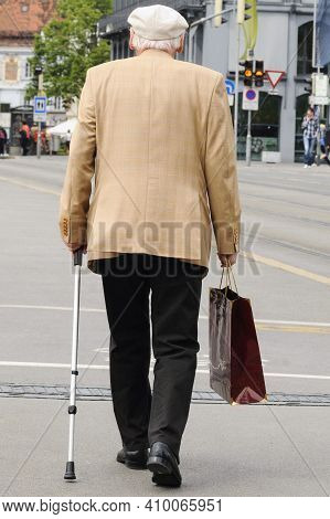 Senior Man With A Walking Stick