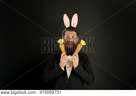 Carrots For Easter. Happy Boss Celebrate Easter. Bearded Bunny Hold Carrots. Enjoying Celebration. H
