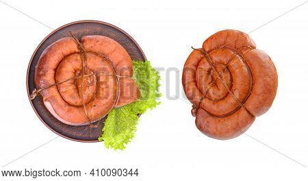 Smoked Sausage Twisted In A Spiral And Bound With A Beechnut, Isolated On A White Background.top Vie