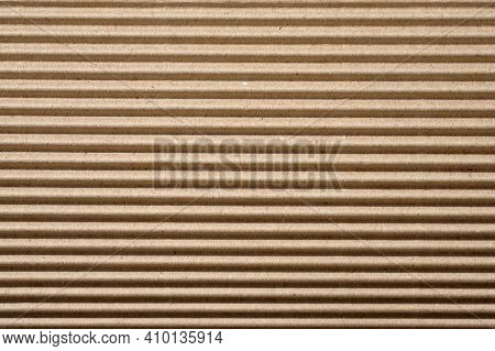 Corrugated Board Close Up Background. Cardboard Packing Material Texture. Cardboard For Use As Packa