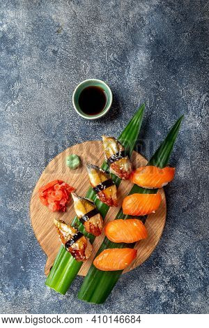 Sushi And Rolls Sets Japonese Food. Top View Gray Background