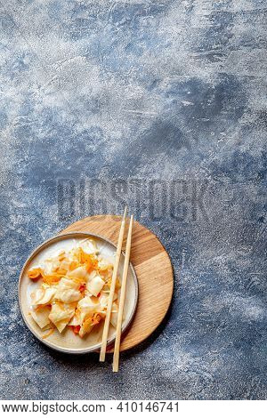 Corean Kimchi. Fermented Spisy Cabbage On Gray Plate, Gray Background