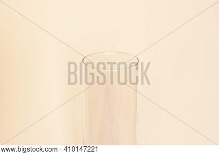 Emprty Glass Transparent Vase On A Beige Background