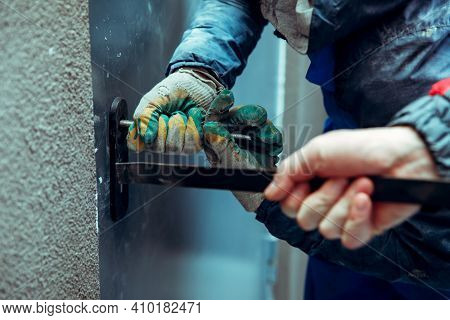 Thieves Robbers Breaks Open The Front Metal Door By Crowbar And Pickpockets - Improvised Tools. Hand