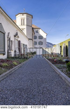 Chur, Switzerland - February 19, 2021: Cemetery Of Chur, The Oldest Town In Switzerland And The Capi