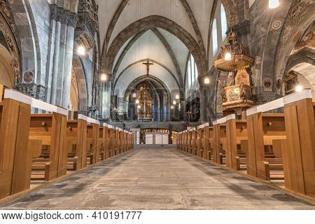 Chur, Switzerland - February 19, 2021: Interior Of The Catholic Cathedral In Chur, The Oldest Town I