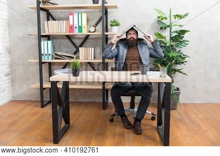 Work Till You Drop. Manager Hold Laptop On Head. Office Work. Running Business. Modern Technology. P